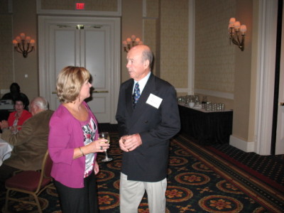 Barbara Bailey Smith talks with teacher Ray Carson